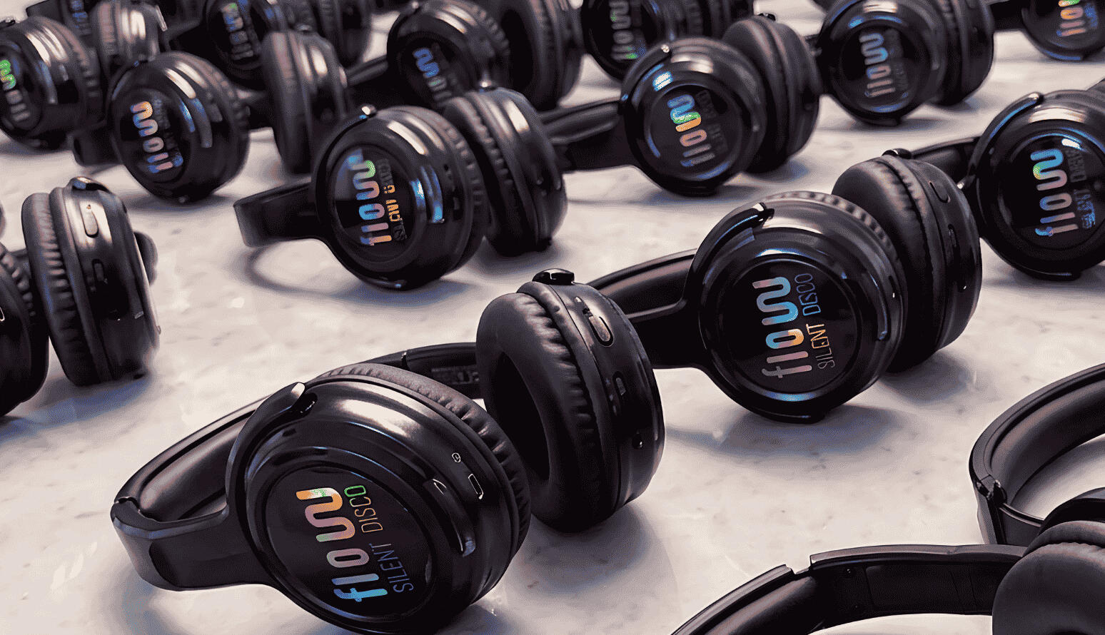 Assortment of Flow Silent Disco headphones